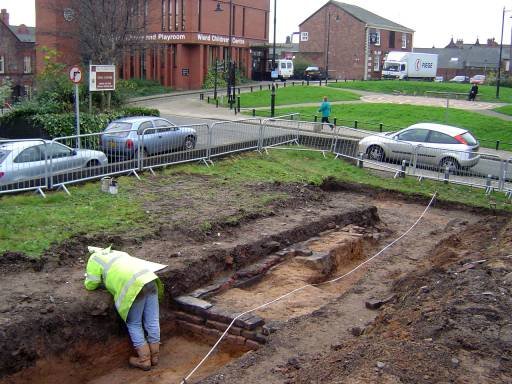 Evaluation trench beside the Ward Children's Centre at the start of the Grand Arcade work
