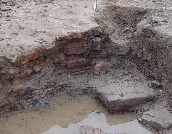 A brick hypocaust flue in the Millgate trench