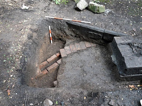 A curved brick structure in the Rectory trench