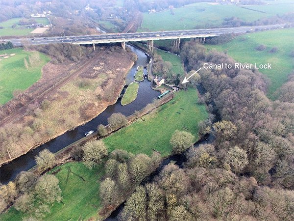 The canal to river lock and the M6 viaduct from the air