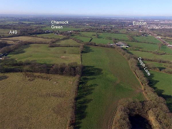 The fields between the A49 and Delph Lane from the air