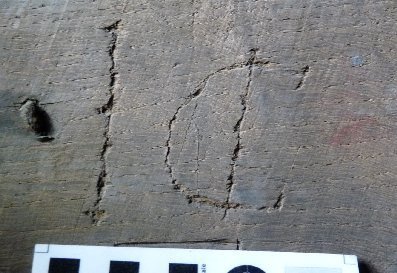 Engraved letters ‘E R’ – boxed with serifs