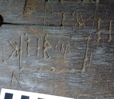 Crudely engraved letters ‘H R’
