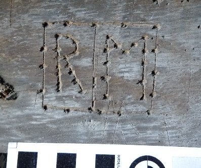 Engraved letters ‘R M’ – boxed with dots
