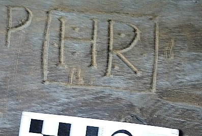 Engraved letters ‘R M’ – boxed with dots
