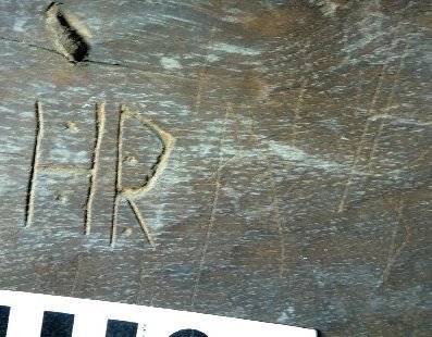 Engraved letters ‘T N’ – with dots